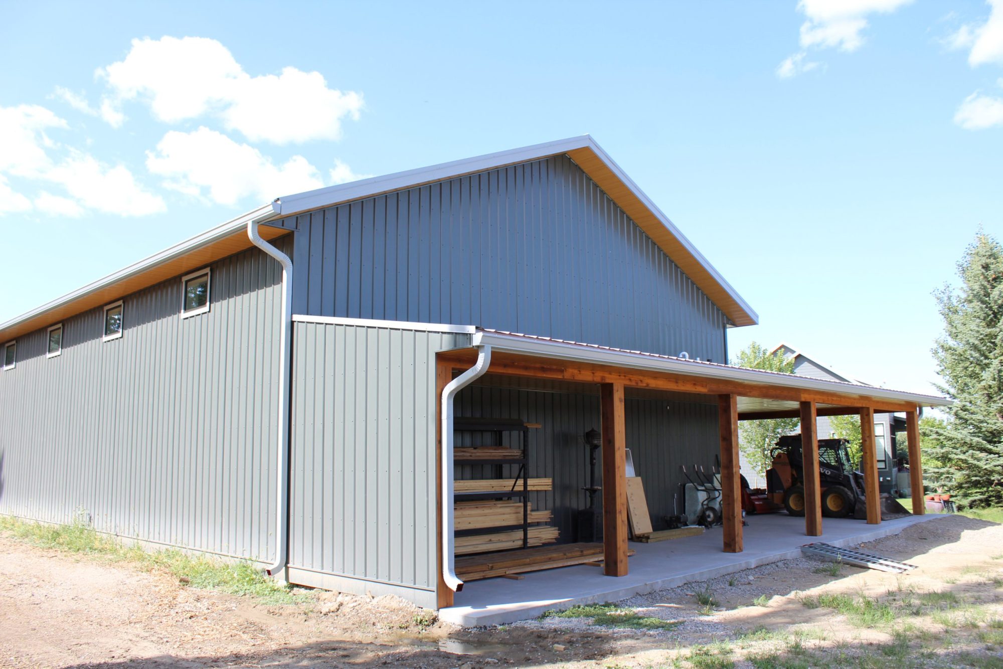 I/9 in Dark Sage and Interloc in Autumn Woodgrain Soffit