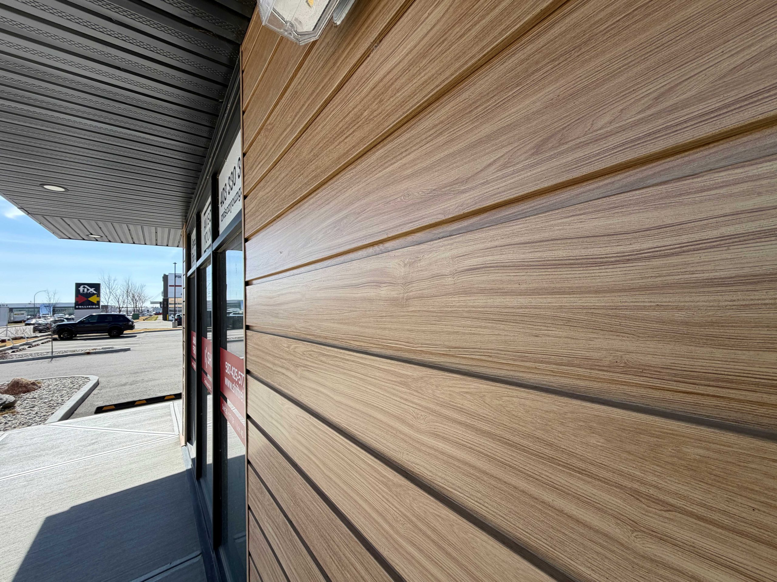 Forma Plank in Light Pine Woodgrain and II/6 Reverse Soffit in Black